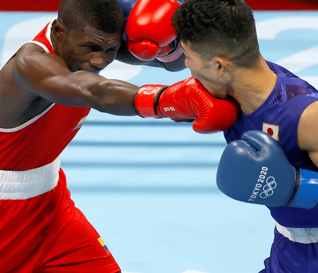 法国拳击选手以速度取胜，成功晋级